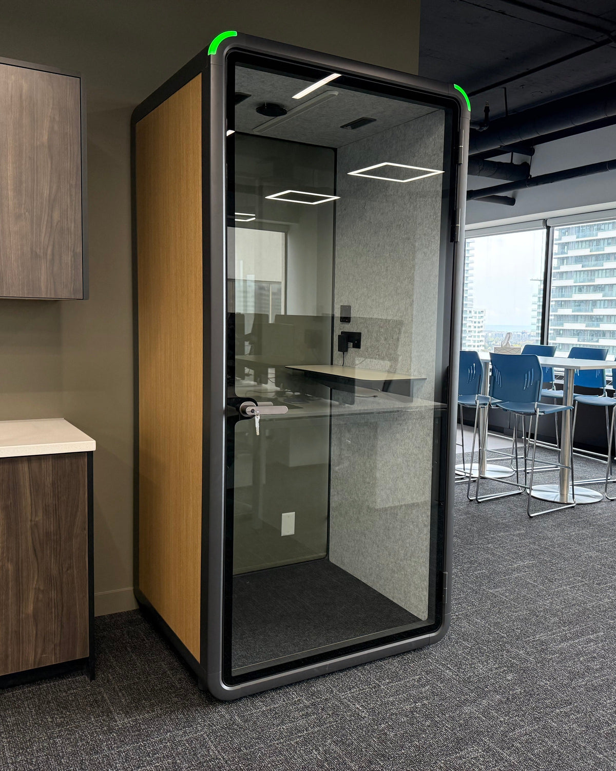 Single Work Booth beside the office kitchenette, a few steps from the bar seating ::real
