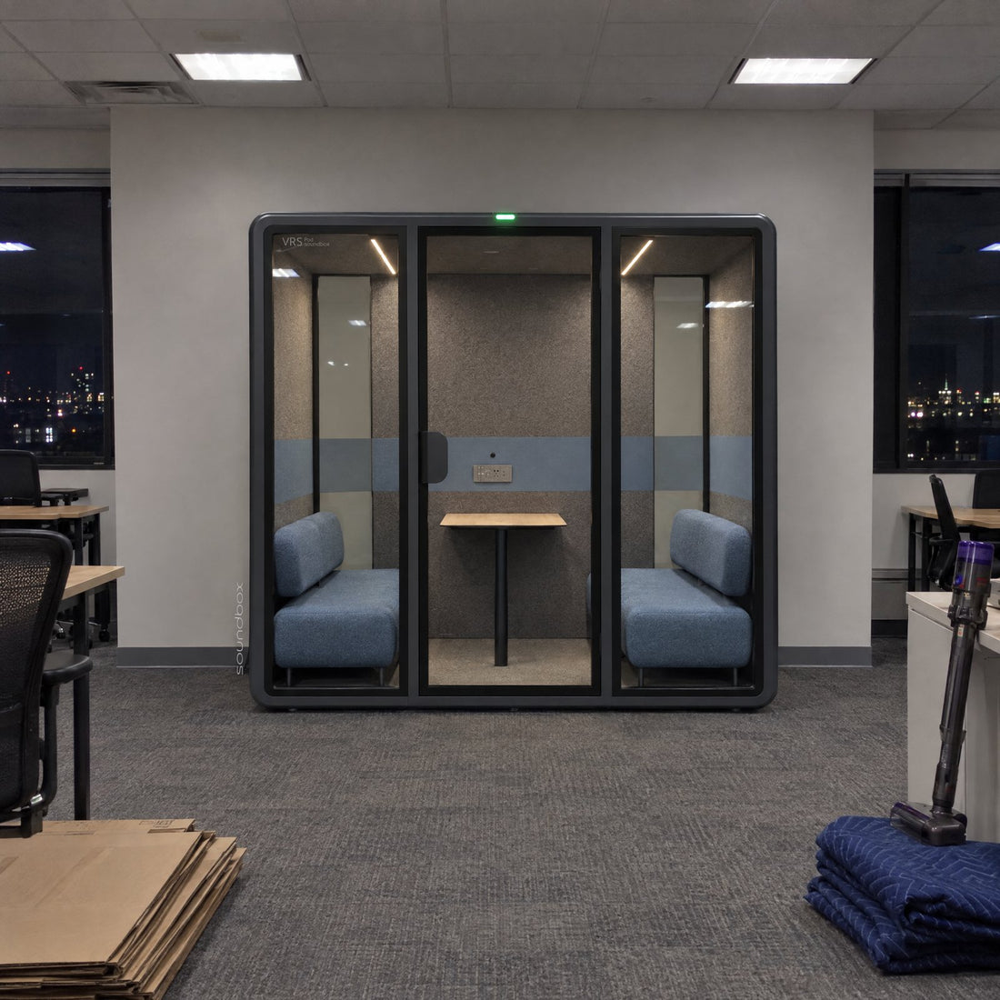 A newly installed Soundbox VRS Collaborative lit up in an empty office in the evening