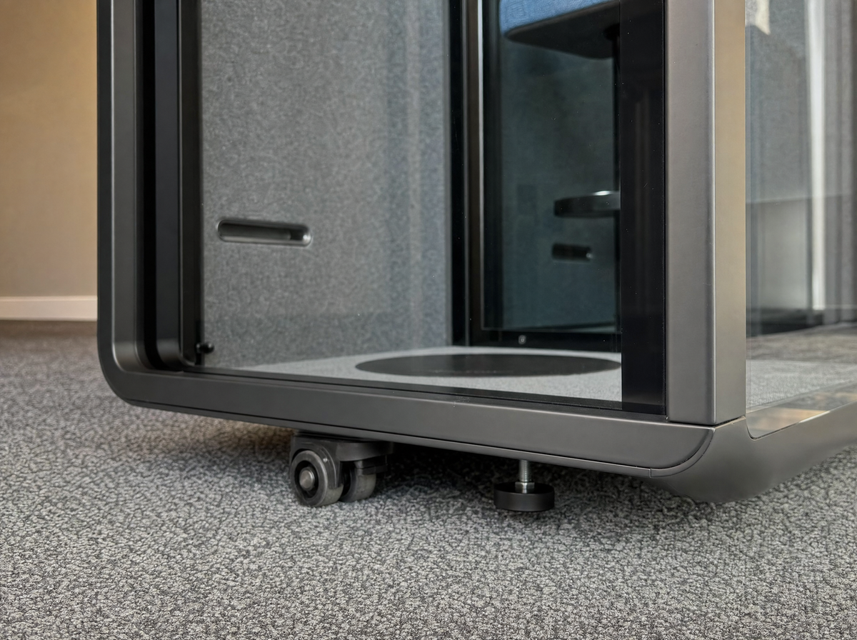 Caster and levelling foot under the base of a SoundBox VRS pod