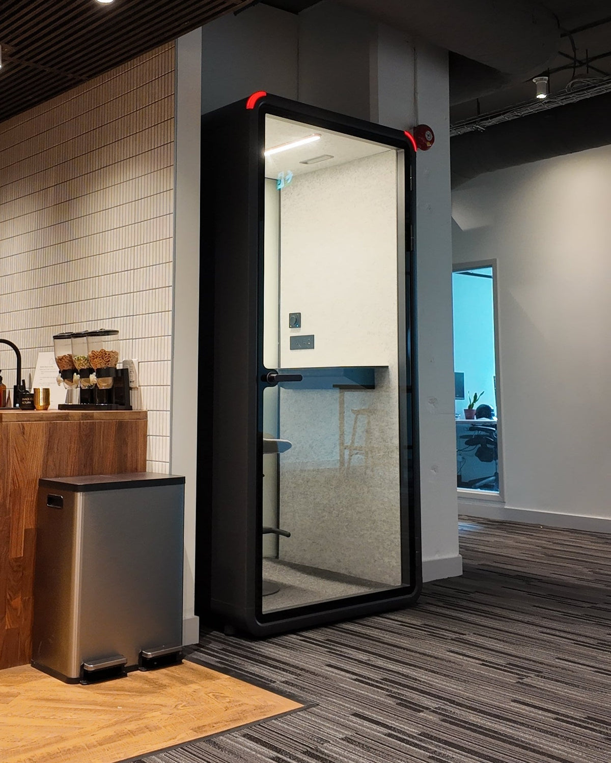 Single Work Booth installed beside an office kitchen counter, the loudest corner of the floor ::real