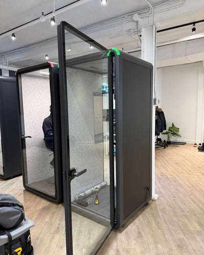 Single Work Booth with the door swung fully open during setup at a Toronto office ::real