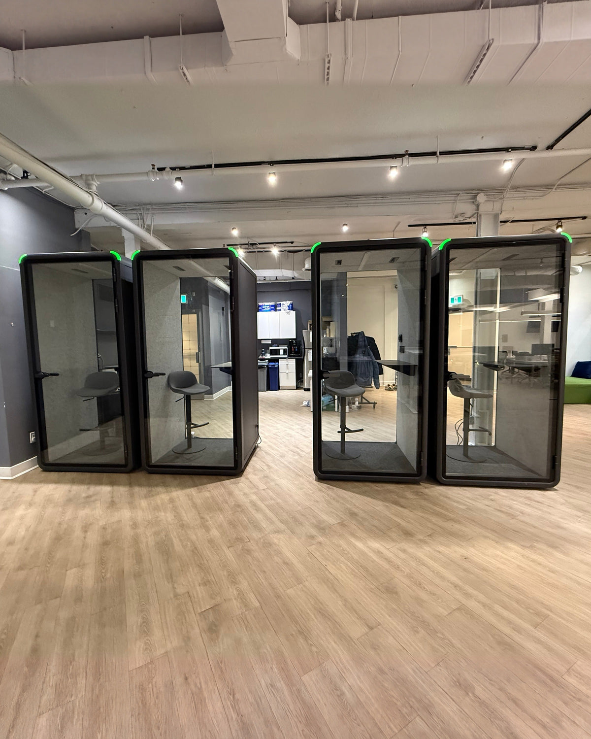 Four Single Work Booths in a row on one office floor. What a rollout looks like once they are in ::real
