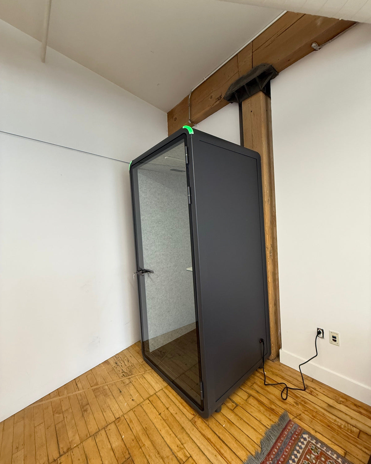 The same loft office with the booth door open. Nothing was built and nothing was bolted to the wall ::real