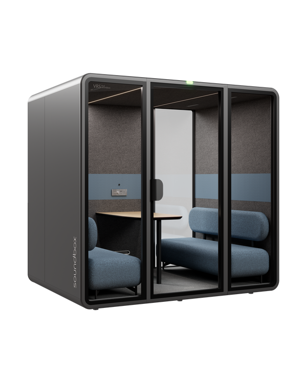 SoundBox VRS Collaborative meeting pod: graphite shell, three glass front panels with a wide centre door, dusty blue sofas and an oak table inside