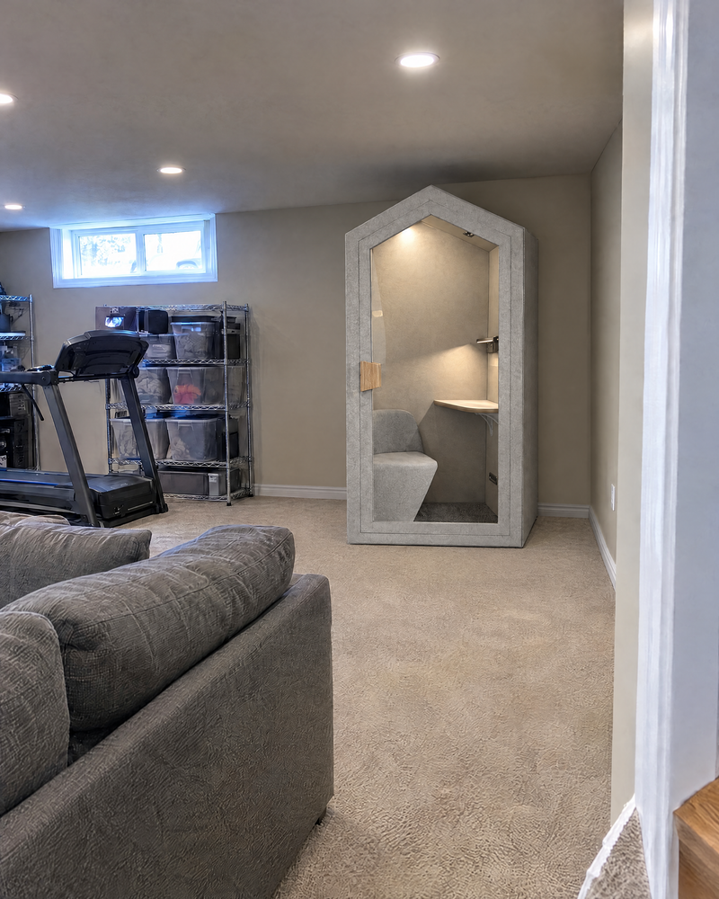 Home Pod against the wall of a finished basement under pot lights, with room above it to the ceiling. Illustration.