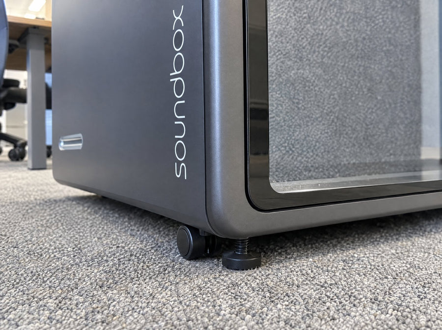 Caster and levelling foot under the base corner of a Soundbox VRS pod