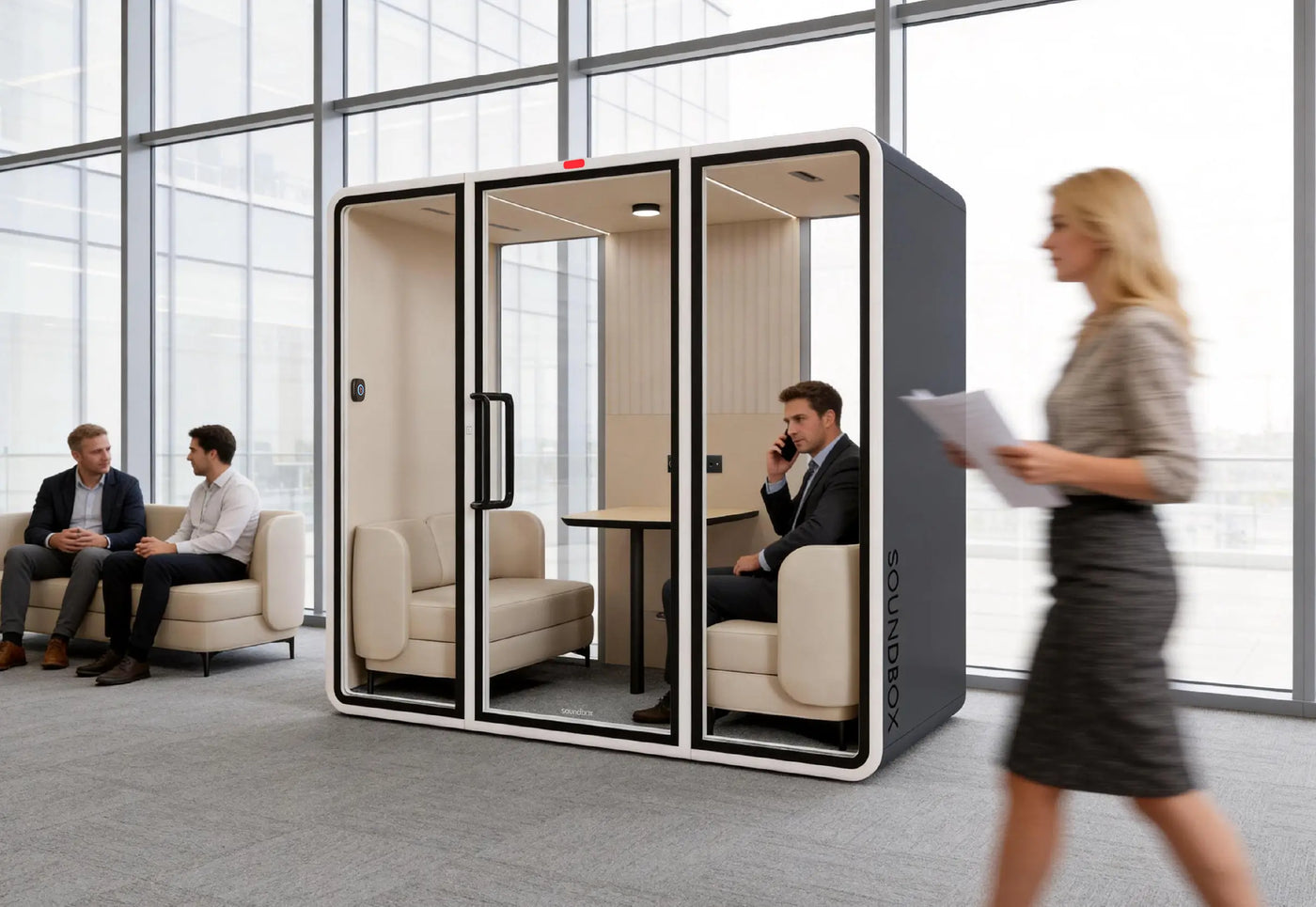A SoundBox VRS pod in use on an open office floor