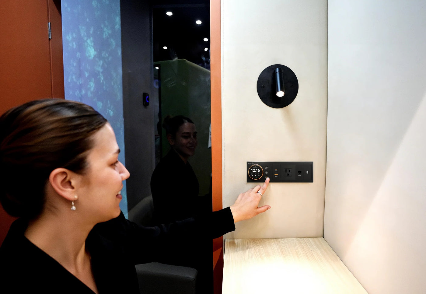 Someone using the control panel inside a SoundBox VRS pod