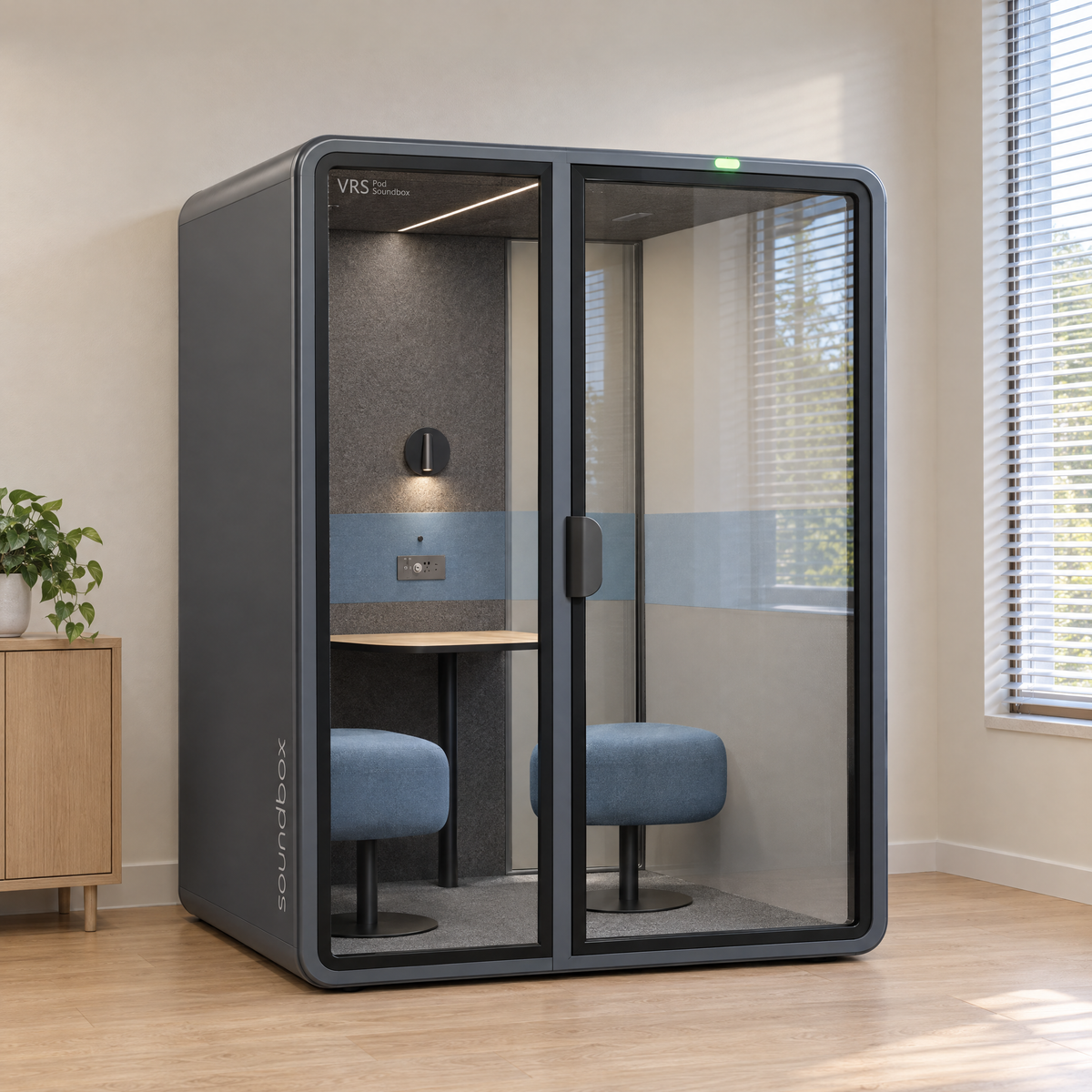 SoundBox VRS Comfort in a bright consulting office by a window, door closed, green available light on. Illustration.
