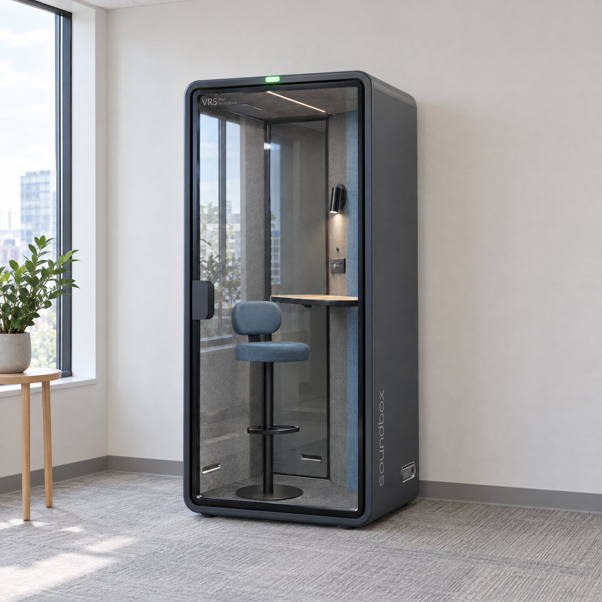 SoundBox VRS Single in a bright office corner by a window, door closed, green available light on. Illustration.