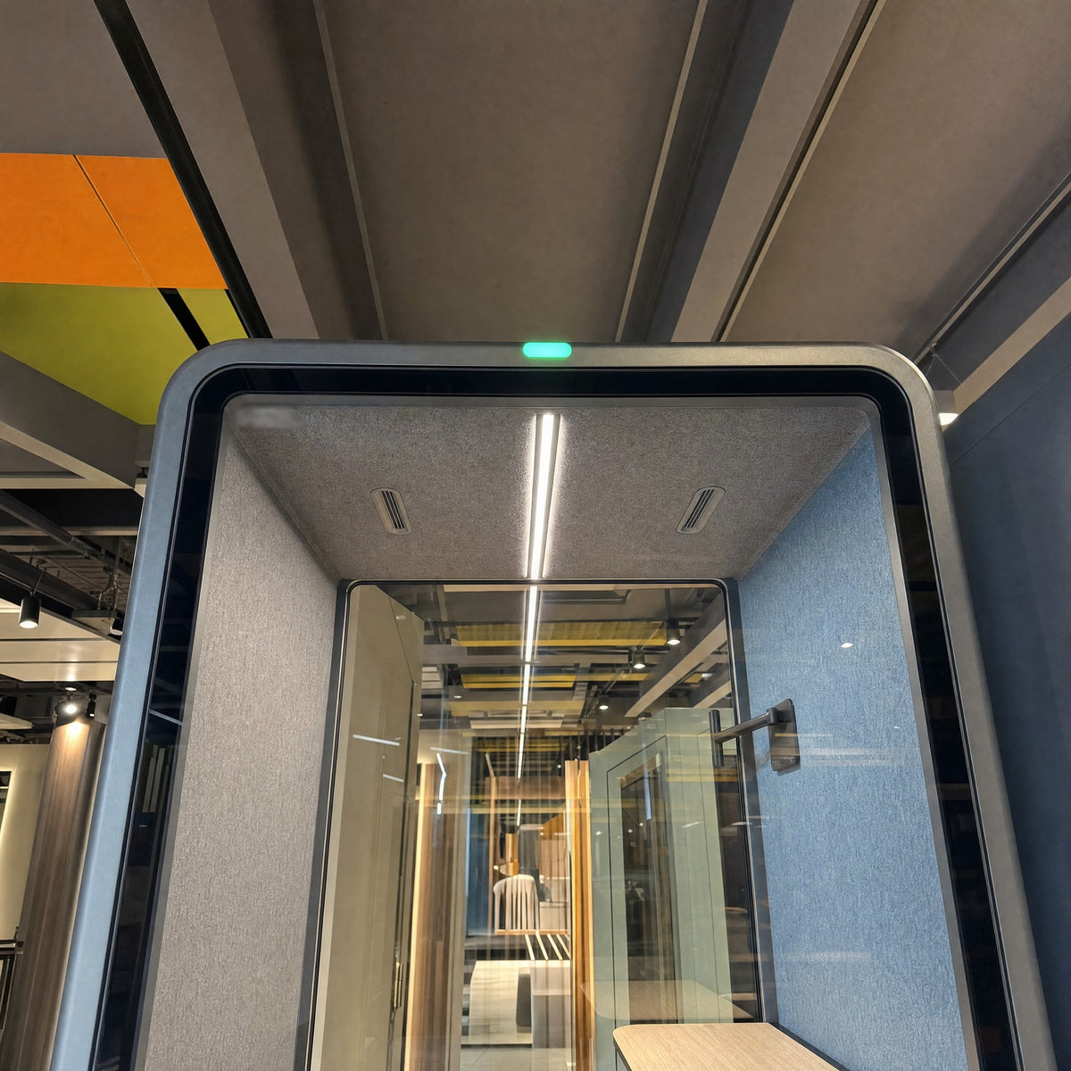 Green availability light on the top edge and ceiling vents of the SoundBox VRS Single