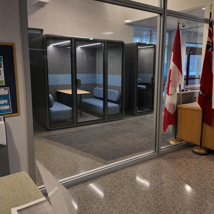 SoundBox VRS-L and VRS-S pods behind a municipal office partition