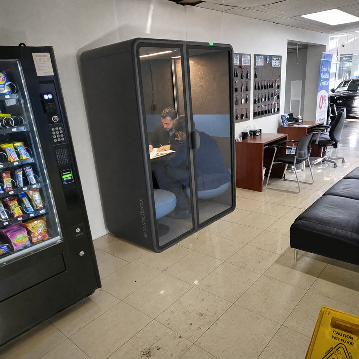 SoundBox VRS-M lounge pod in a car dealership sales area