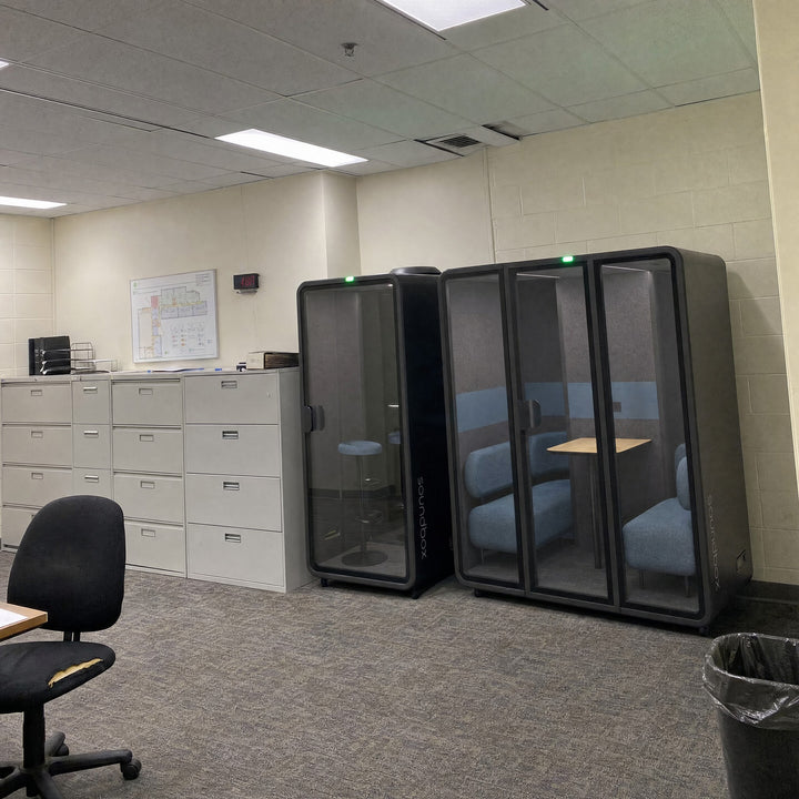 SoundBox VRS-ML pod and VRS-S booth beside filing cabinets in a government office