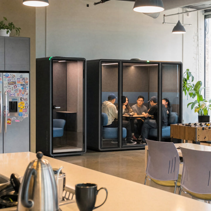 SoundBox VRS-SM booth and VRS-L pod beside a software company kitchen