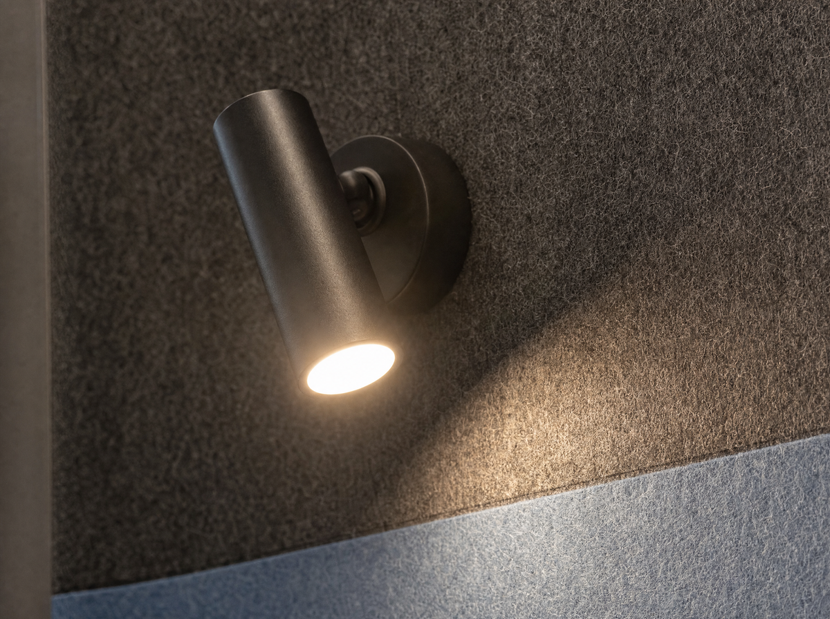 Black focus downlight on the felt wall of a SoundBox VRS pod